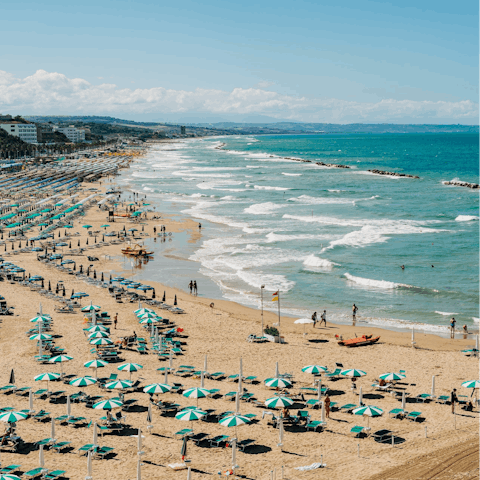 Head to the Italian beaches of the west coast, an eight-minute drive away
