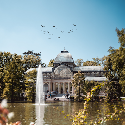 Visit El Retiro Park, a thirty-minute walk away