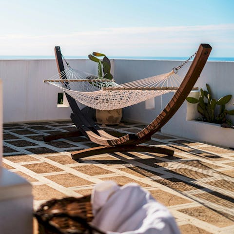 Curl up in the hammock for a sun-kissed catnap