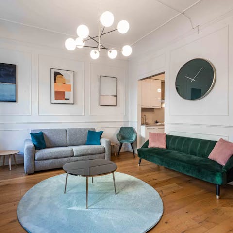 Relax in the elegant living room with a glass of Tuscan wine