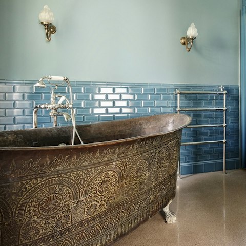 Soak in one of the ornate, free-standing bathtubs