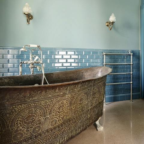 Soak in one of the ornate, free-standing bathtubs