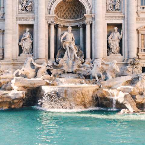 Start your sightseeing at the nearby Trevi Fountains