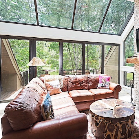 Curl up on the comfy leather sofa