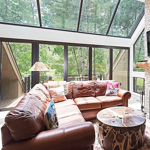 Curl up on the comfy leather sofa