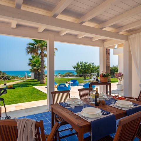 Gather for celebratory sunset drinks and Italian meals on the terrace