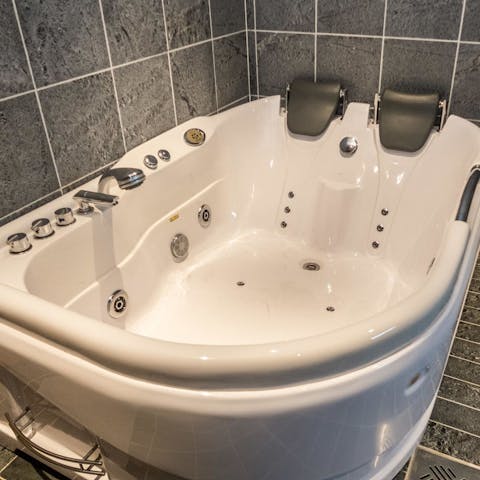 Wind down with a soak in the whirlpool bath