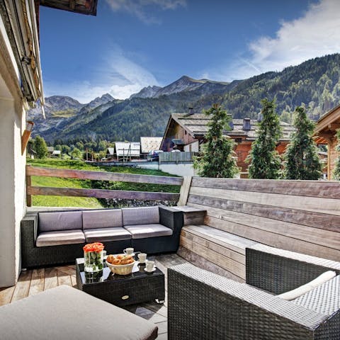 Sip your morning coffee on the balcony with the mountains as your backdrop