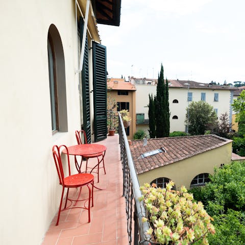 Relax on the private balcony with a glass of Prosecco