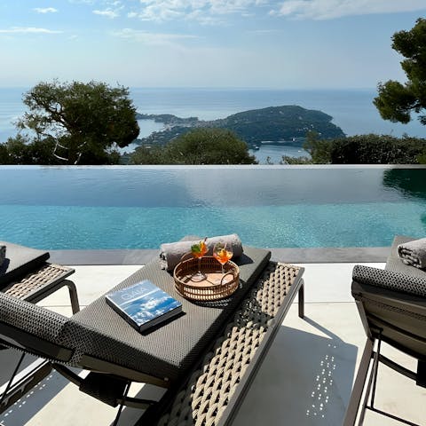 Enjoy panoramic sea views from your spot at the poolside