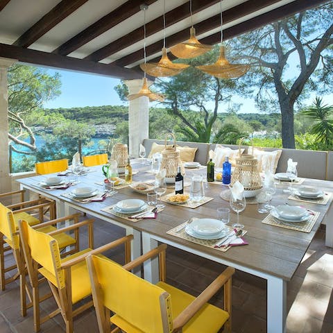 Tuck into delicious local takeaways around the dining table on the covered terrace