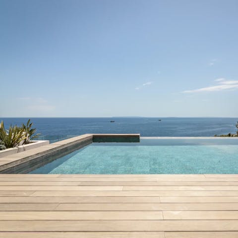 Start your morning with a swim in the glistening infinity pool