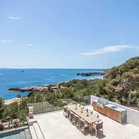 Dine alfresco while admiring the sweeping sea views