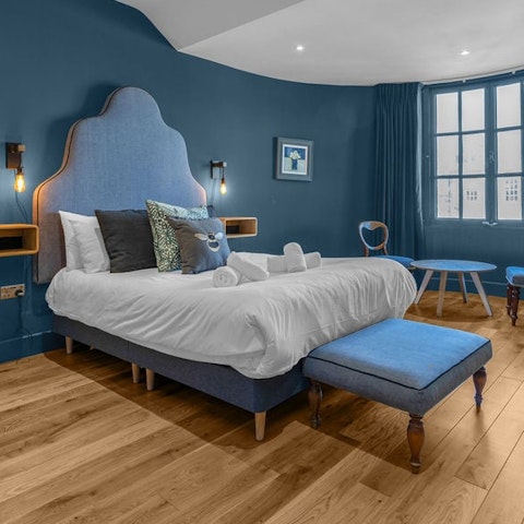 Wind down in a plush king-size bed after a busy day