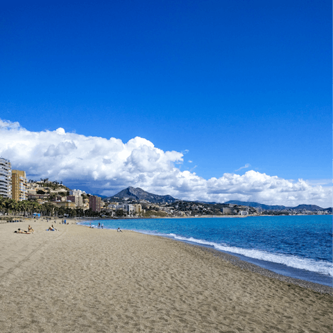 Stretch your legs with a wander over to the sandy Malagueta Beach