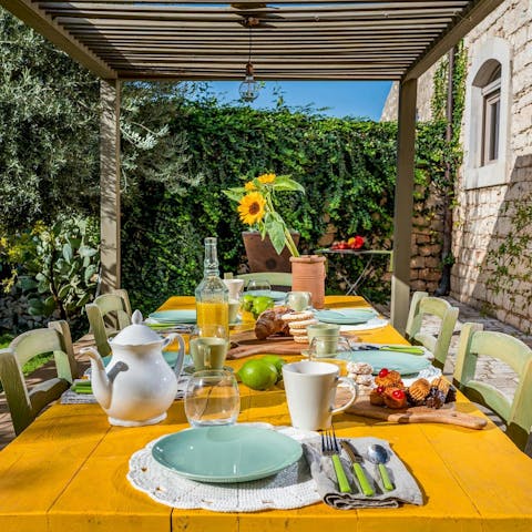 Tuck into an alfresco Sicilian feast on the terrace