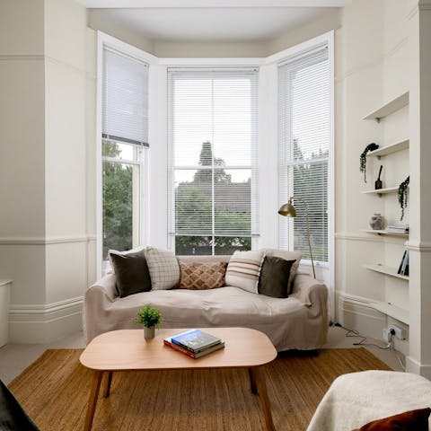 Admire the garden views from the bay window