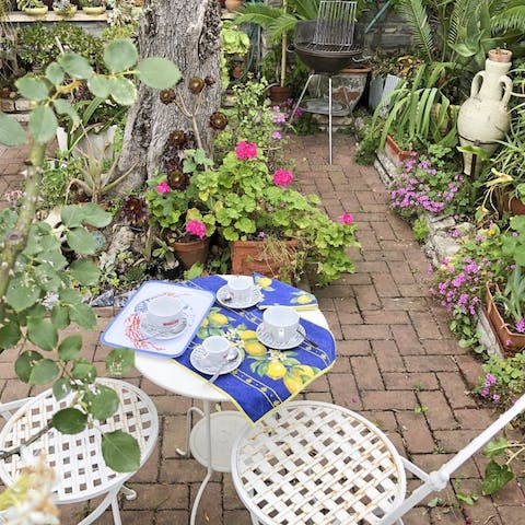Savour morning coffees in the pretty front garden