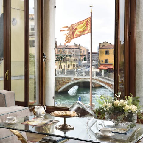 Admire views of canals from every window of this elegant home