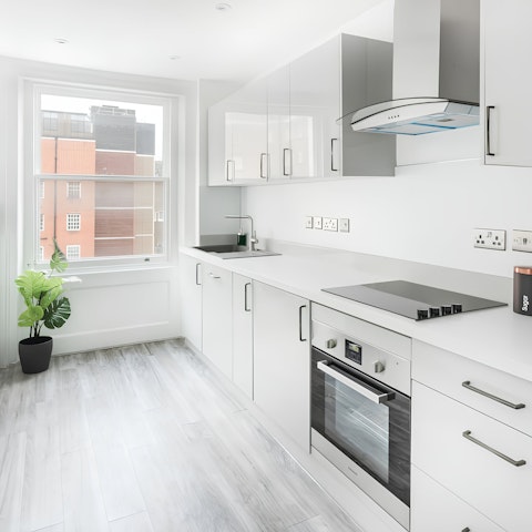 Fire up the coffee pod machine in the light-filled, modern kitchen