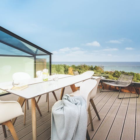 Admire views of the sea from your rooftop terrace