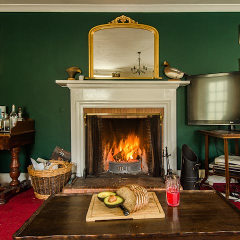 Return home after a bracing walk and sit next to one of the open fires