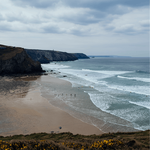 Stroll down to Porthleven Beach and feel the soft sand between your toes