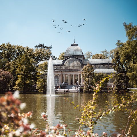 Take a sunny stroll through El Retiro Park, twenty-four minutes away on foot