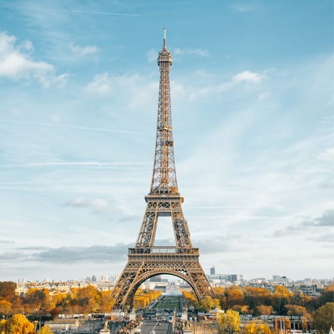 Ascend the iconic Eiffel Tower, a short drive away