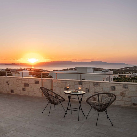 Catch sunset over the sea from the terrace