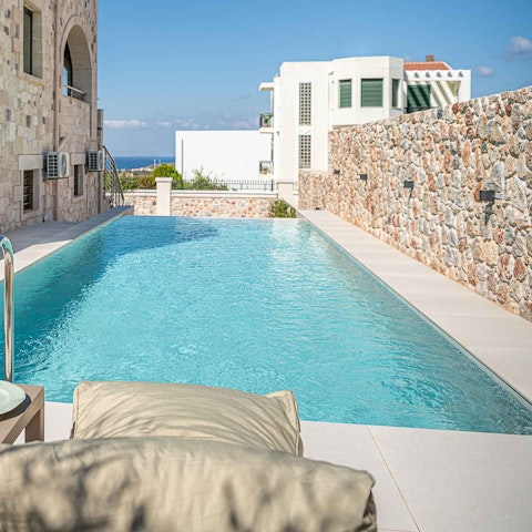 Cool off in the pool or lay back on a comfortable lounger