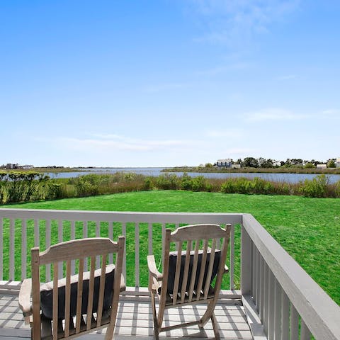 Take in the sweeping view of the bay with the sea beyond