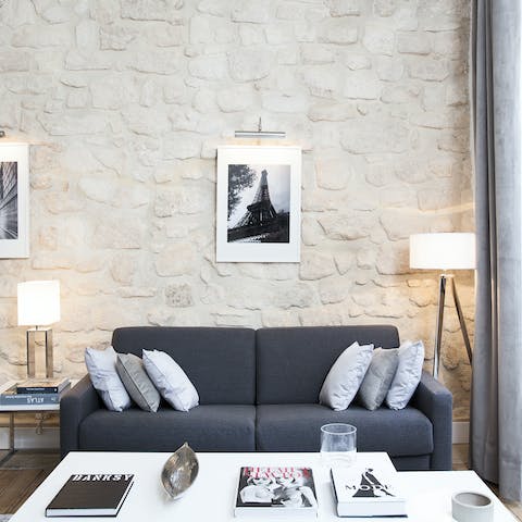 Kick back in the bright living room with a glass of French wine after a day of Paris sightseeing