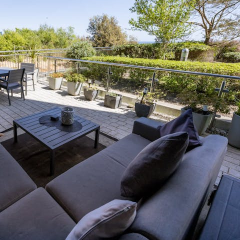 Start the day with a hot mug of coffee on the terrace