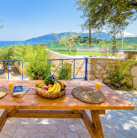 Enjoy breakfast as you gaze out at the sea and mountain vistas
