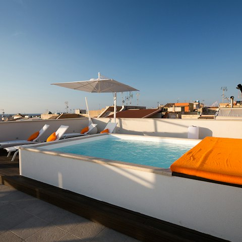 Take a dip in the rooftop pool, shared with other residents