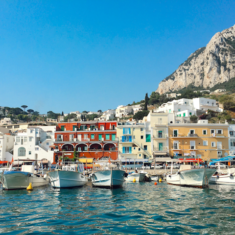 Explore Capri's bustling marina, a twenty minute walk away