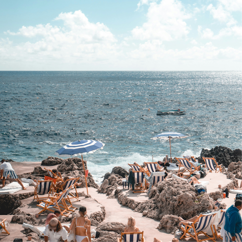 Join the locals on the beaches of Marina Piccola and Marina Grande