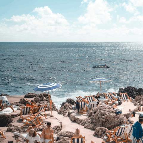 Join the locals on the beaches of Marina Piccola and Marina Grande