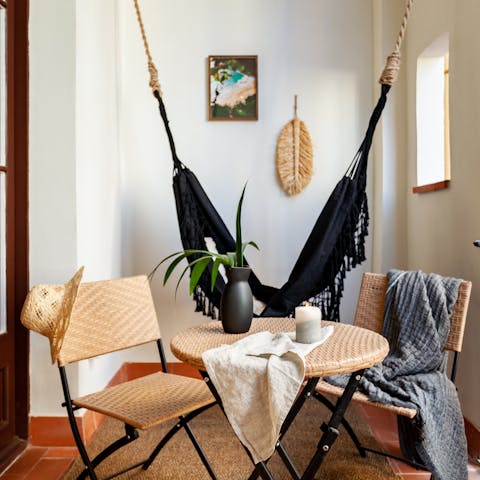 Enjoy an evening sangria on the home's small balcony