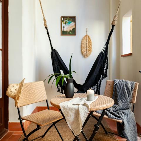 Enjoy an evening sangria on the home's small balcony