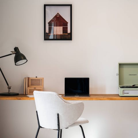 Make use of the laptop-friendly workspace or play an album on the record player