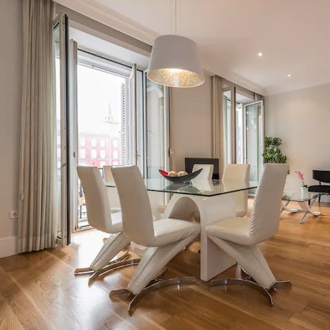 Serve up fresh orange juice and pastries for brunch on the modern dining table