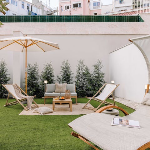 Watch a sunset over Lisbon from the large private terrace