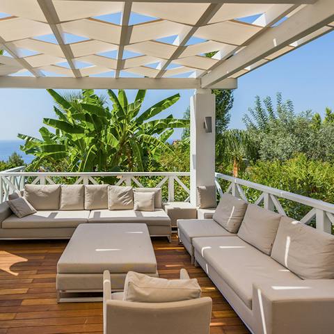 Pick up a book and put your feet up under the veranda