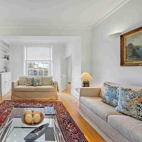 Curl up with morning coffees in the light-filled living room