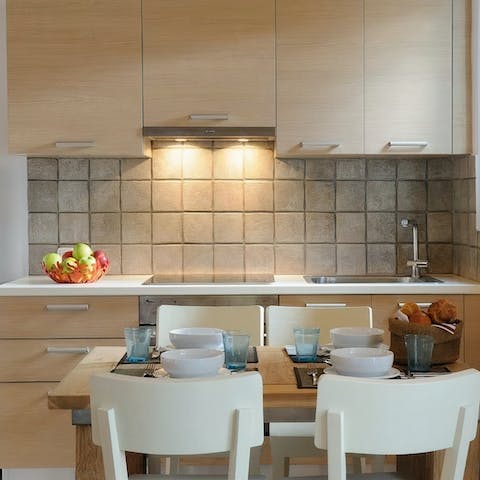 Cook up light meals in the compact but equipped kitchen