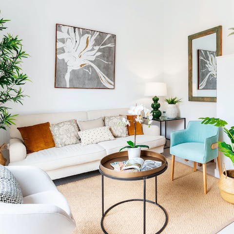 Relax on the plush sofa after a long day of exploring and walking around the city