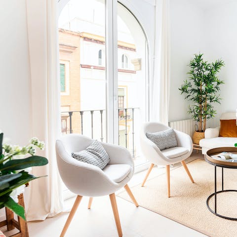 Enjoy a glass of wine on the chair, people-watching out of the Juliet balcony