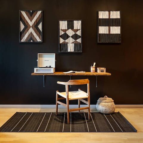 Catch up on work at the desk, or listen to some tunes on the record player